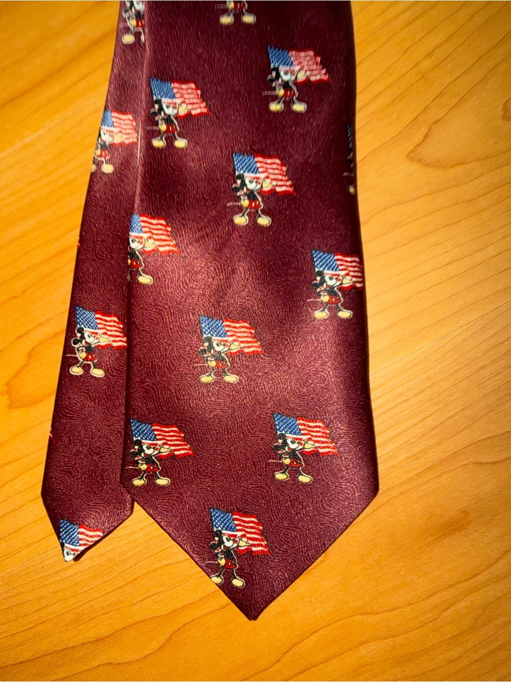 Mickey Mouse holding American flag tie with tag - Picture 1 of 4